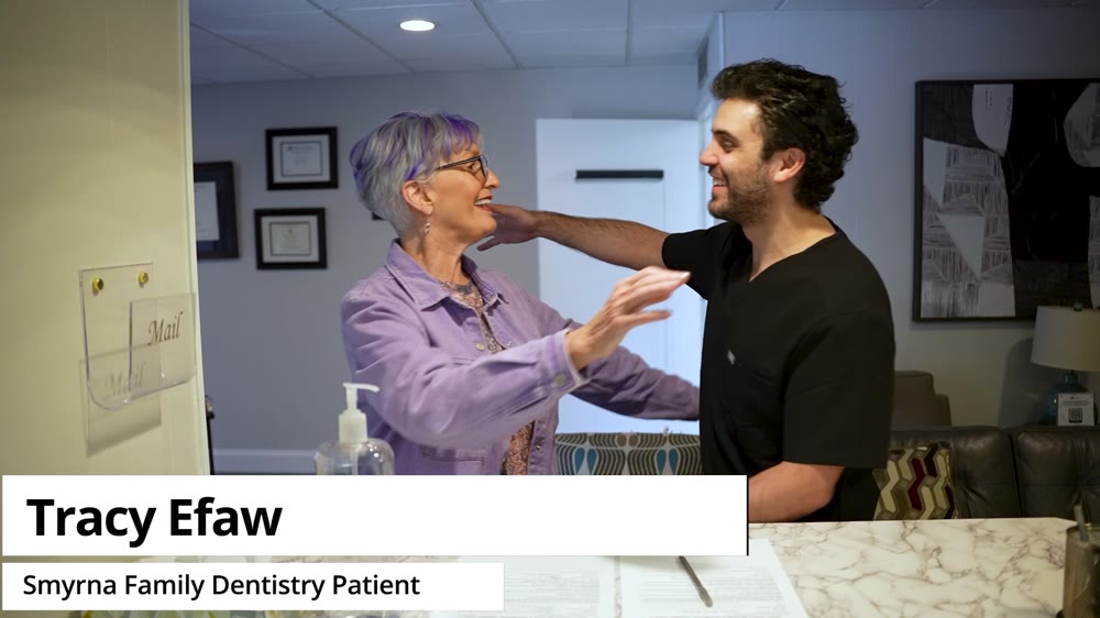 A Smyrna Family Dentistry patient sharing a moment with her dentist